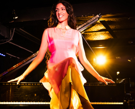 Performer sitting on piano